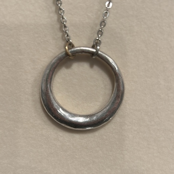 Silver and gold colored circle pendant necklace. Adjustable to 2 lengths. - Picture 6 of 6